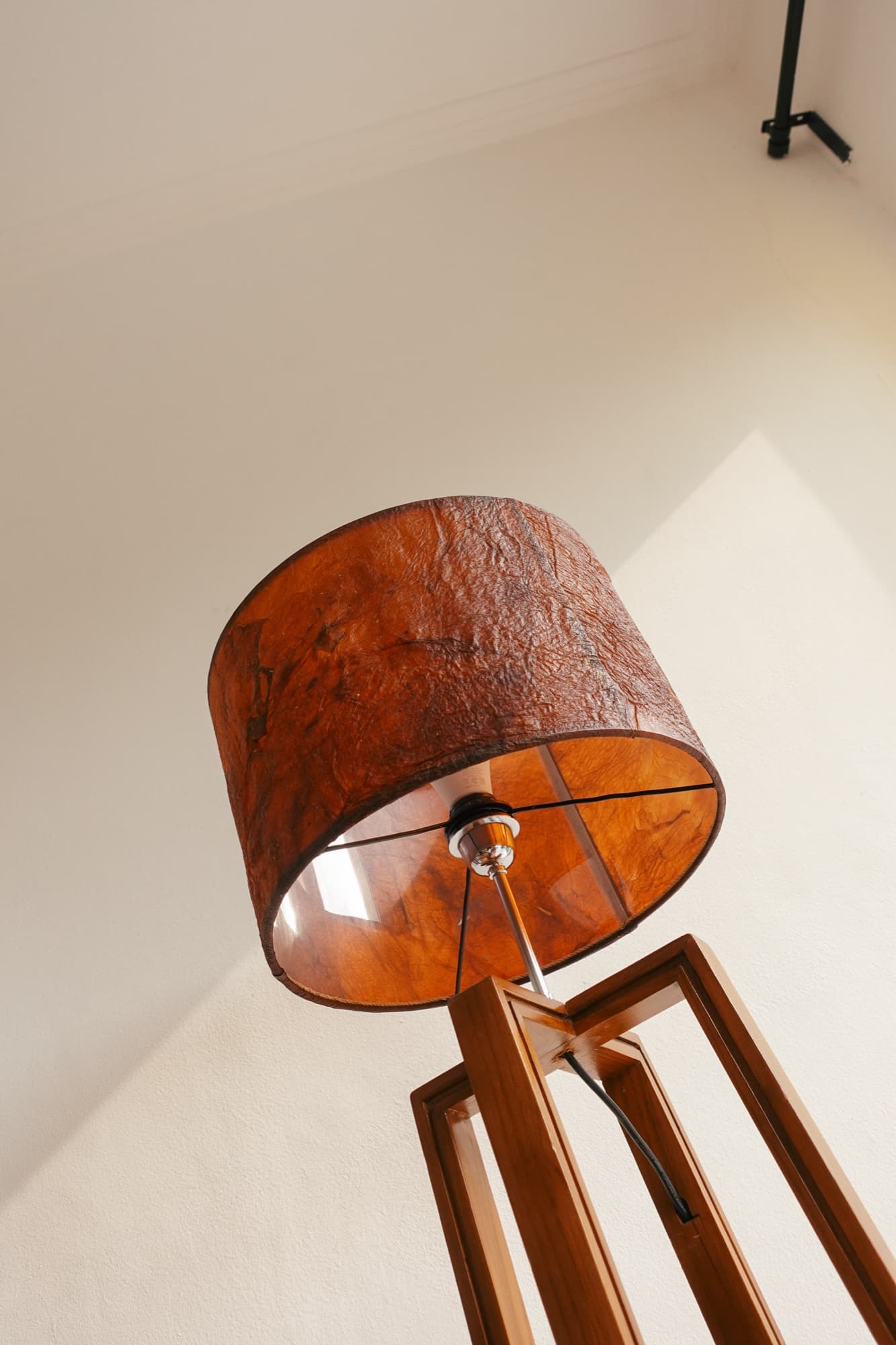 A lit Symbia bioleather floor lamp