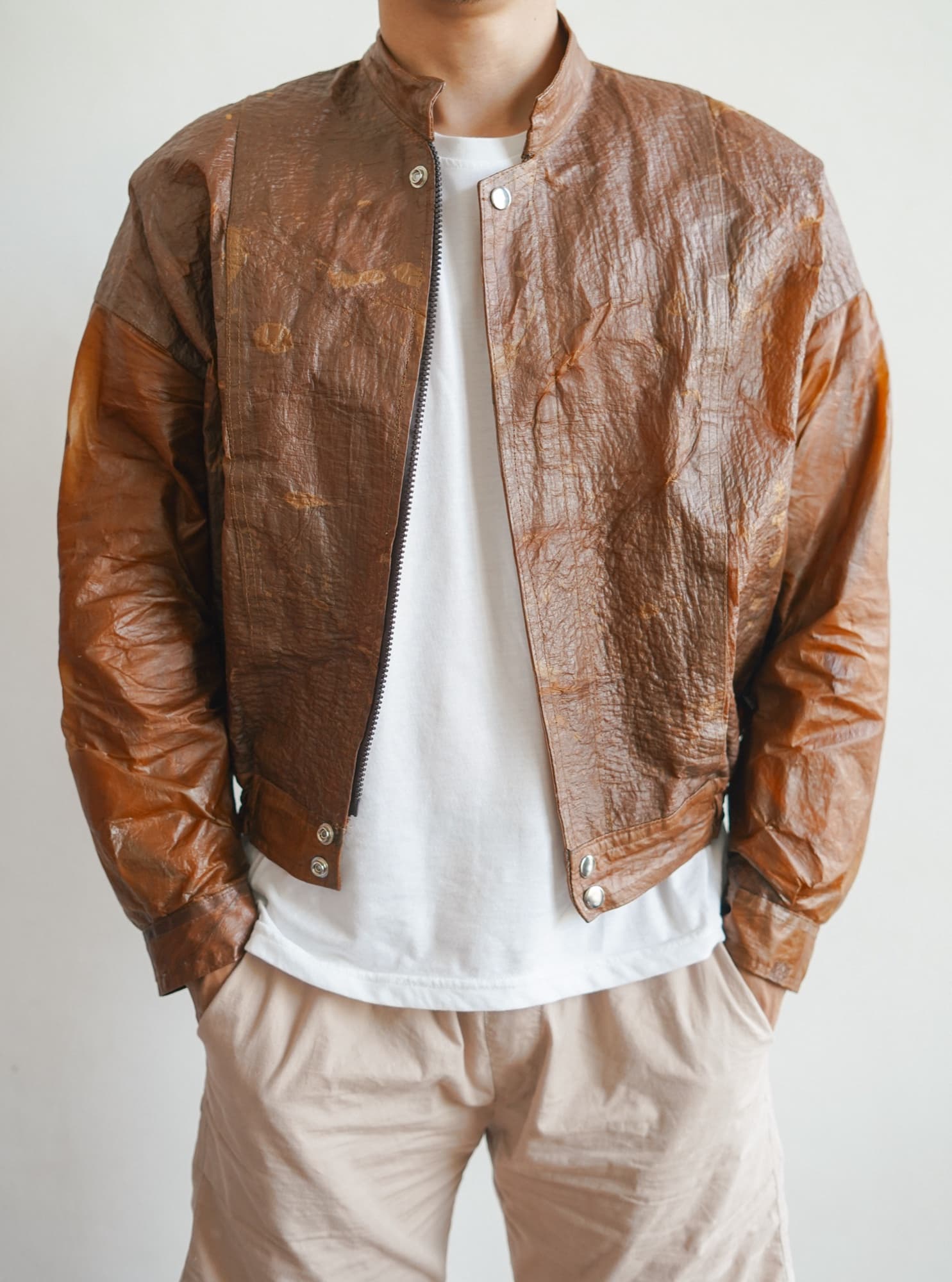 A model wearing a Symbia bioleather jacket, front
