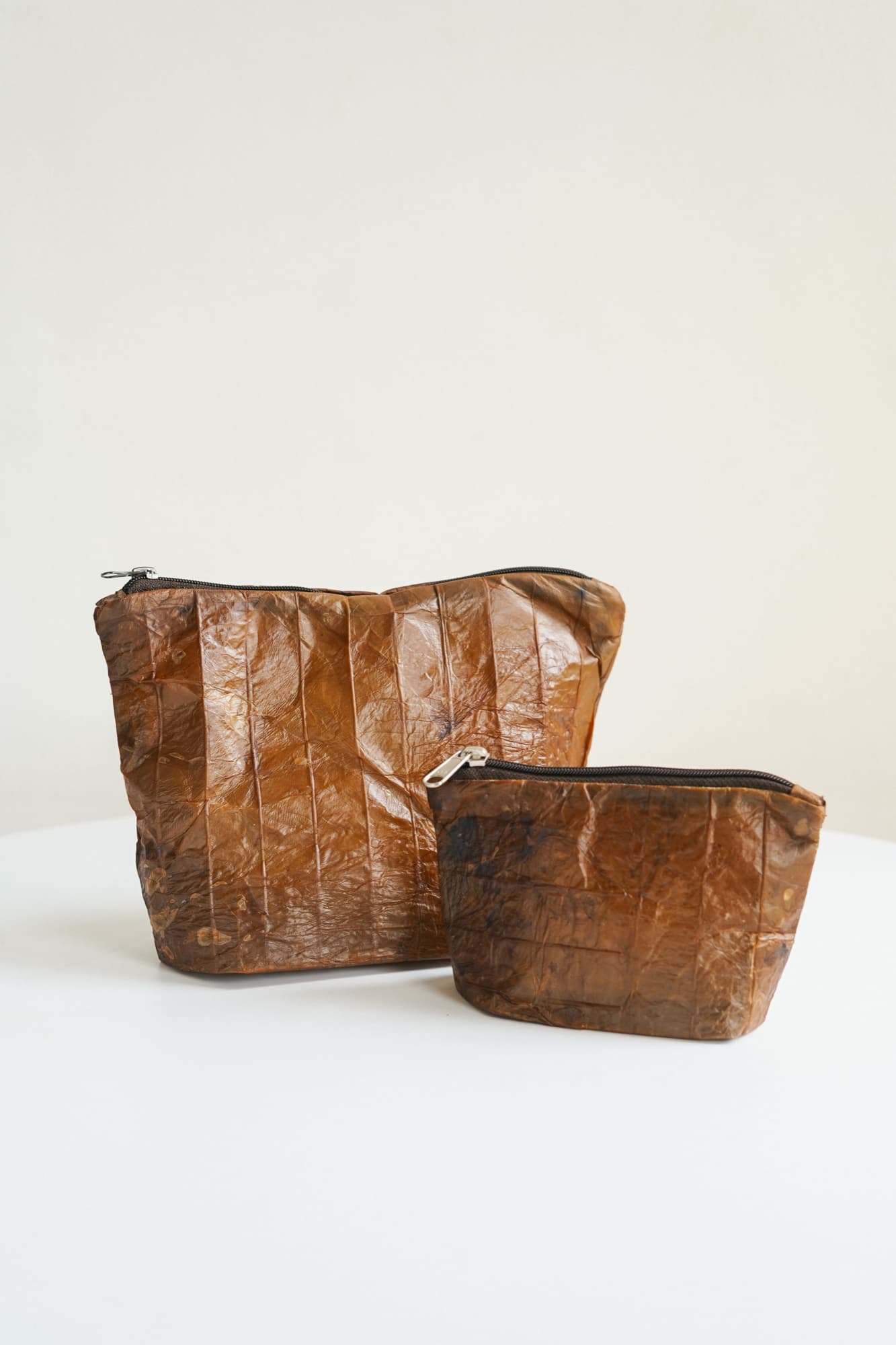 A pair of Symbia bioleather pouches