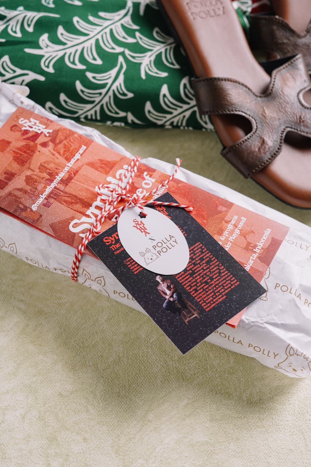 Symbia sandals with packaging