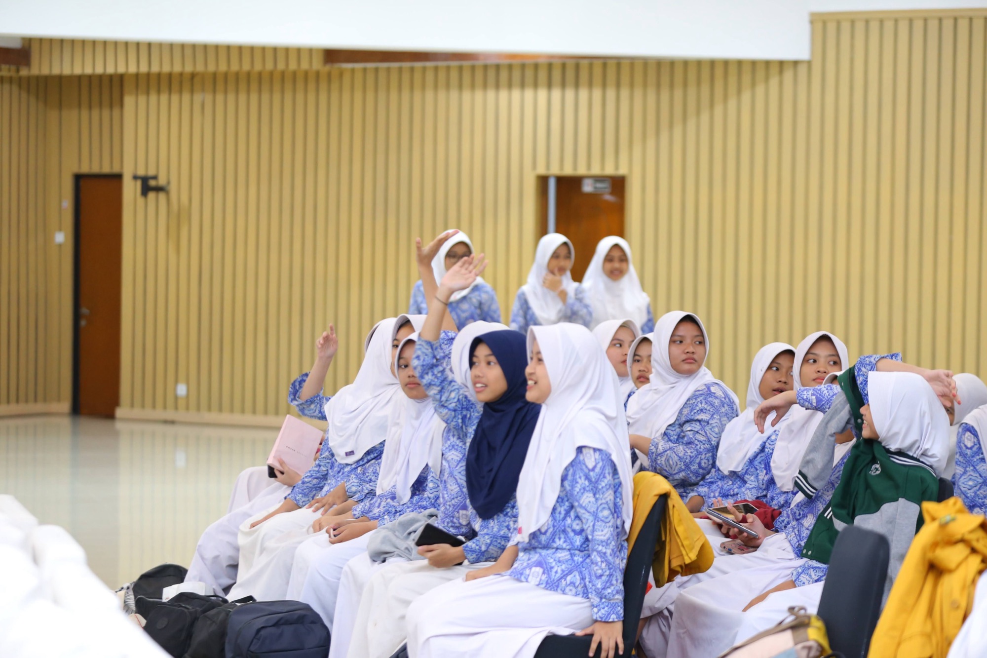 Students filling the hall at a Symbia seminar in Indonesia